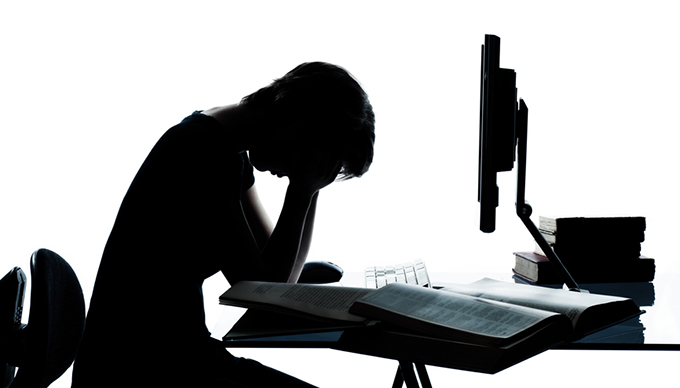 one young teenager boy girl silhouette studying with computer c